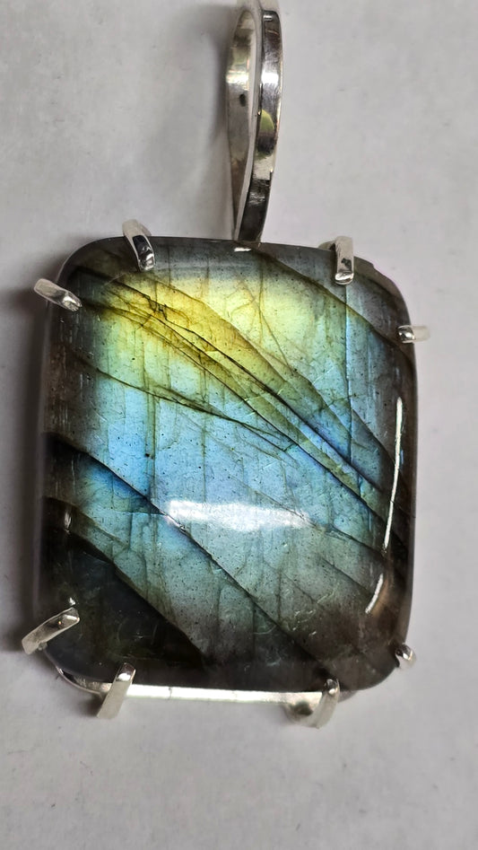Labradorite set in silver pendant.