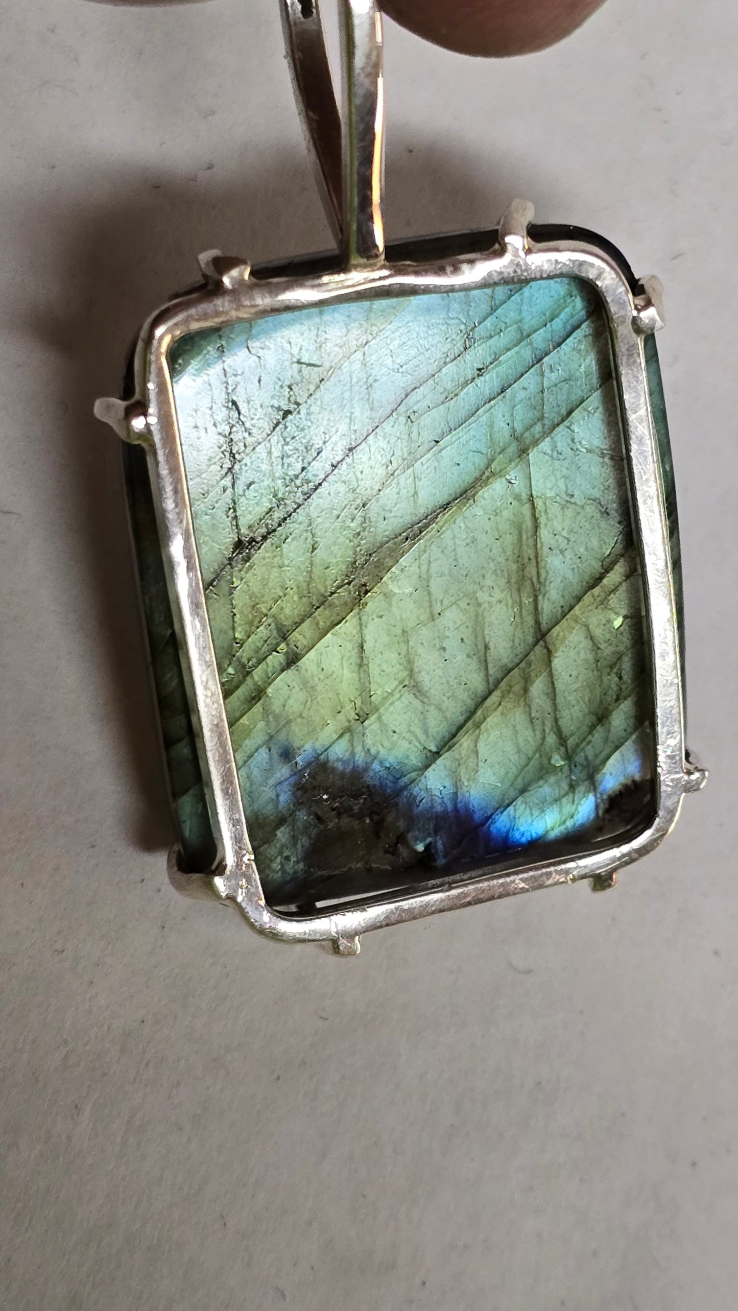 Labradorite set in silver pendant.
