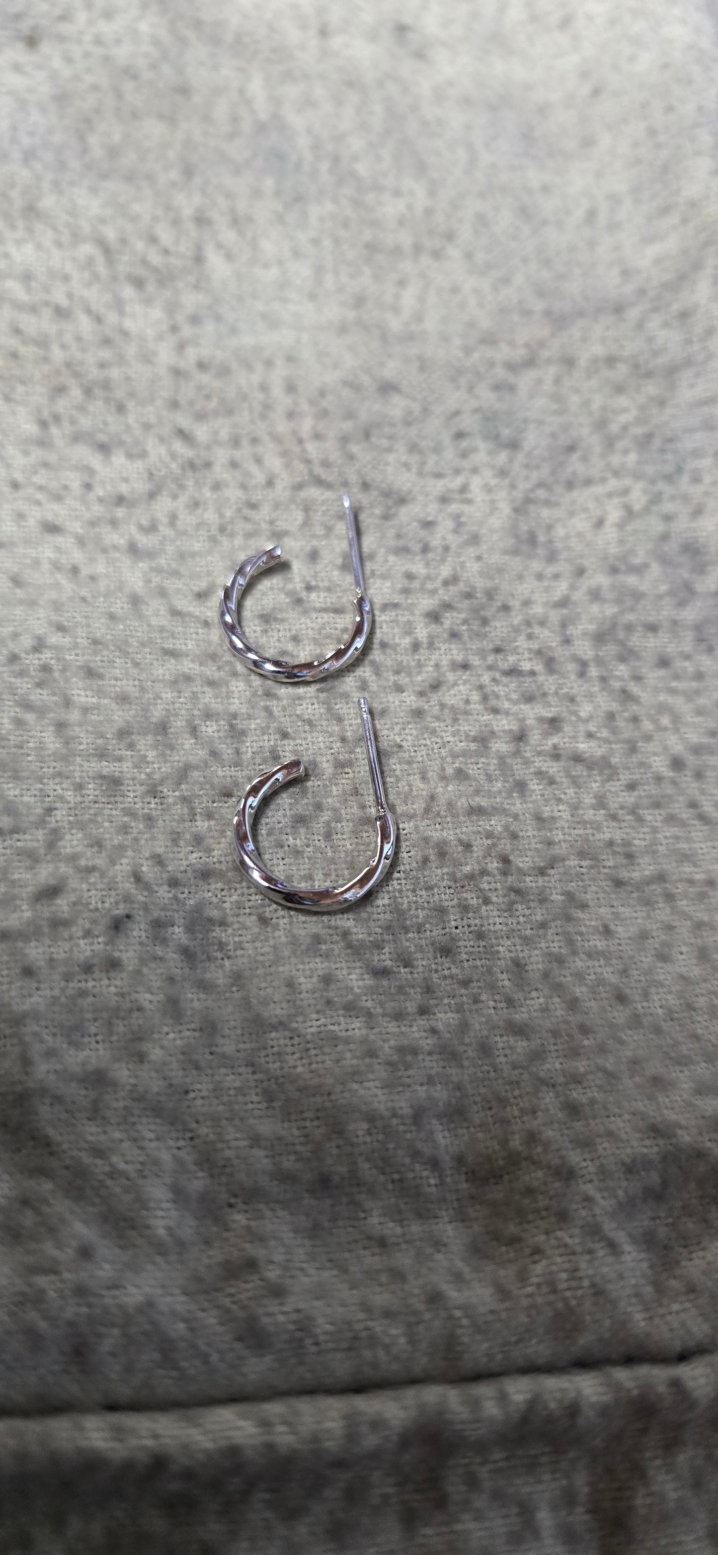 1.5mm sterling silver twisted hoop earrings.