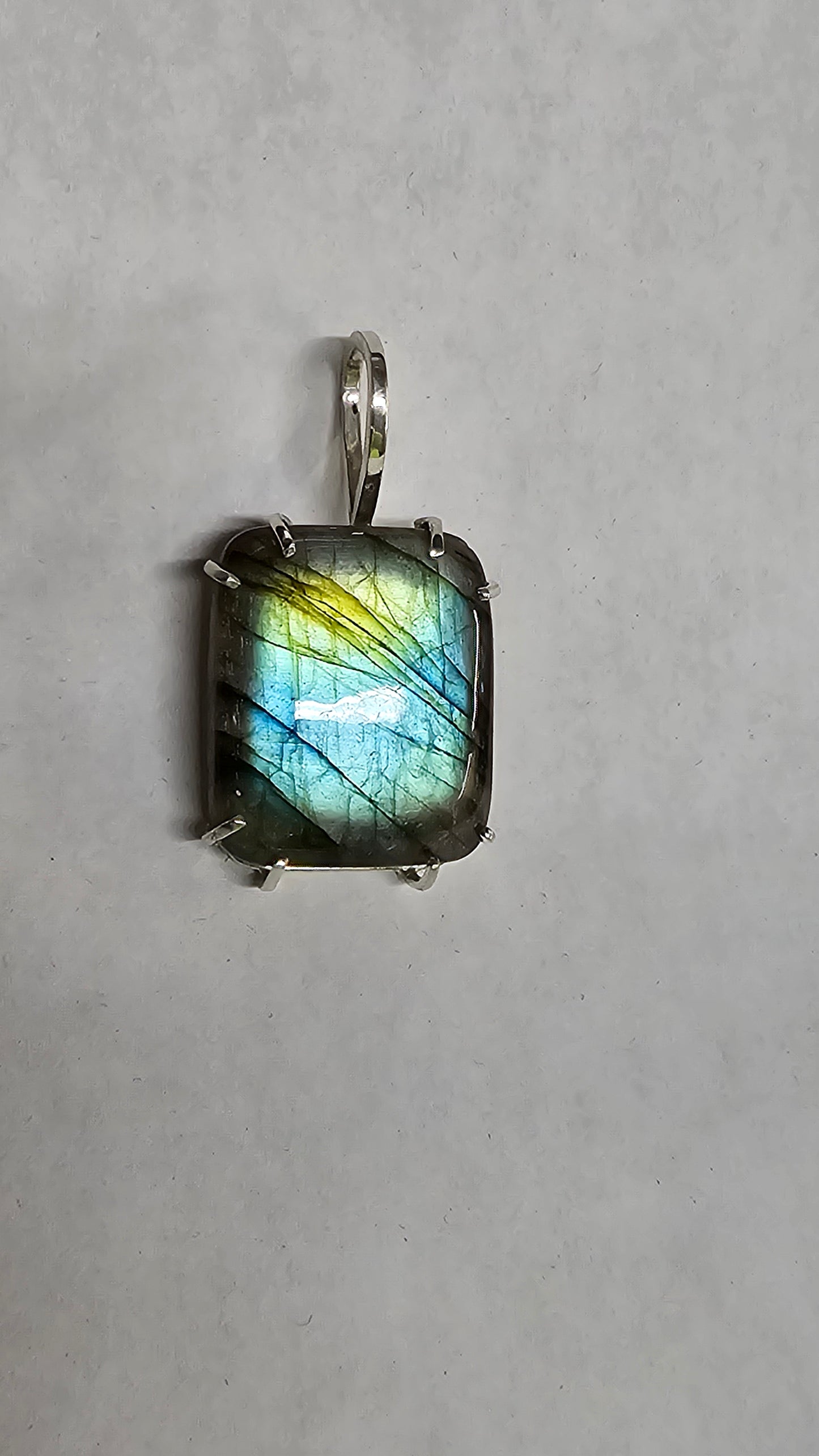 Labradorite set in silver pendant.