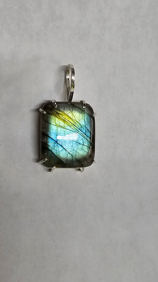 Labradorite set in silver pendant.